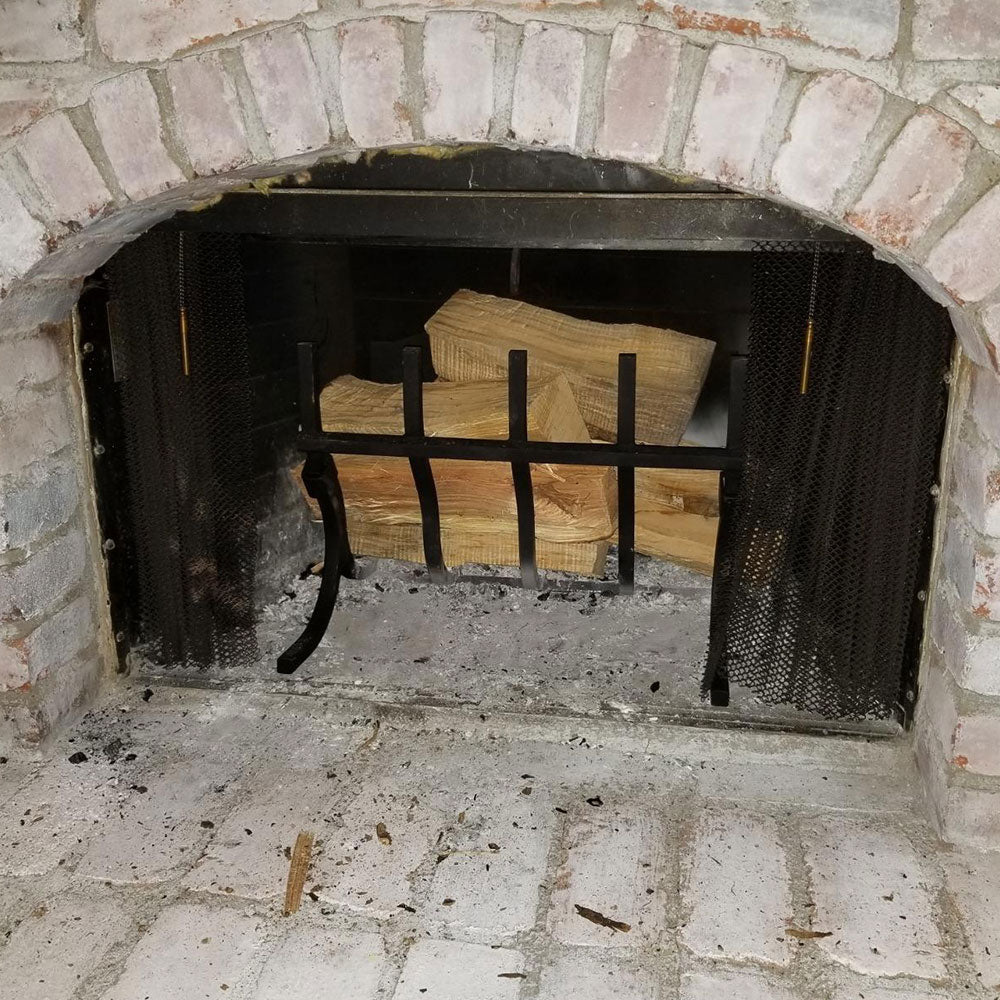 High-Efficiency Log Grate with Reflective Fireback