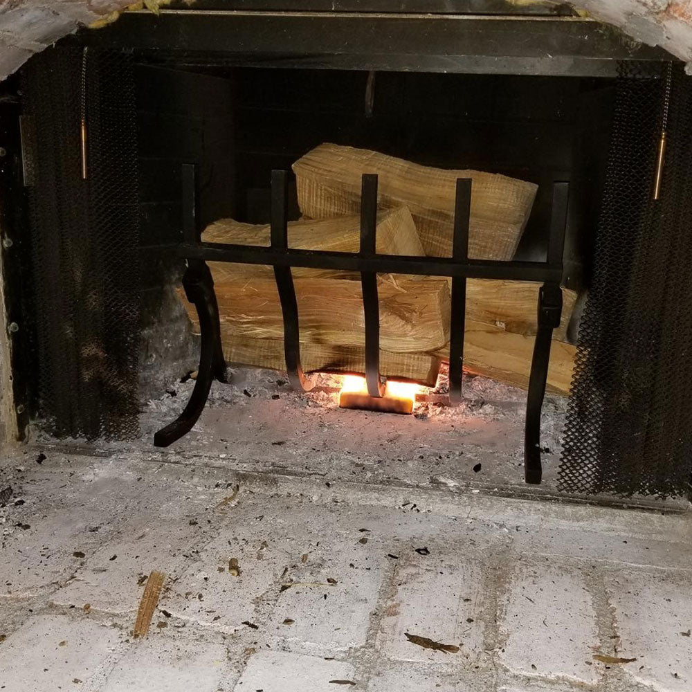 High-Efficiency Log Grate with Reflective Fireback