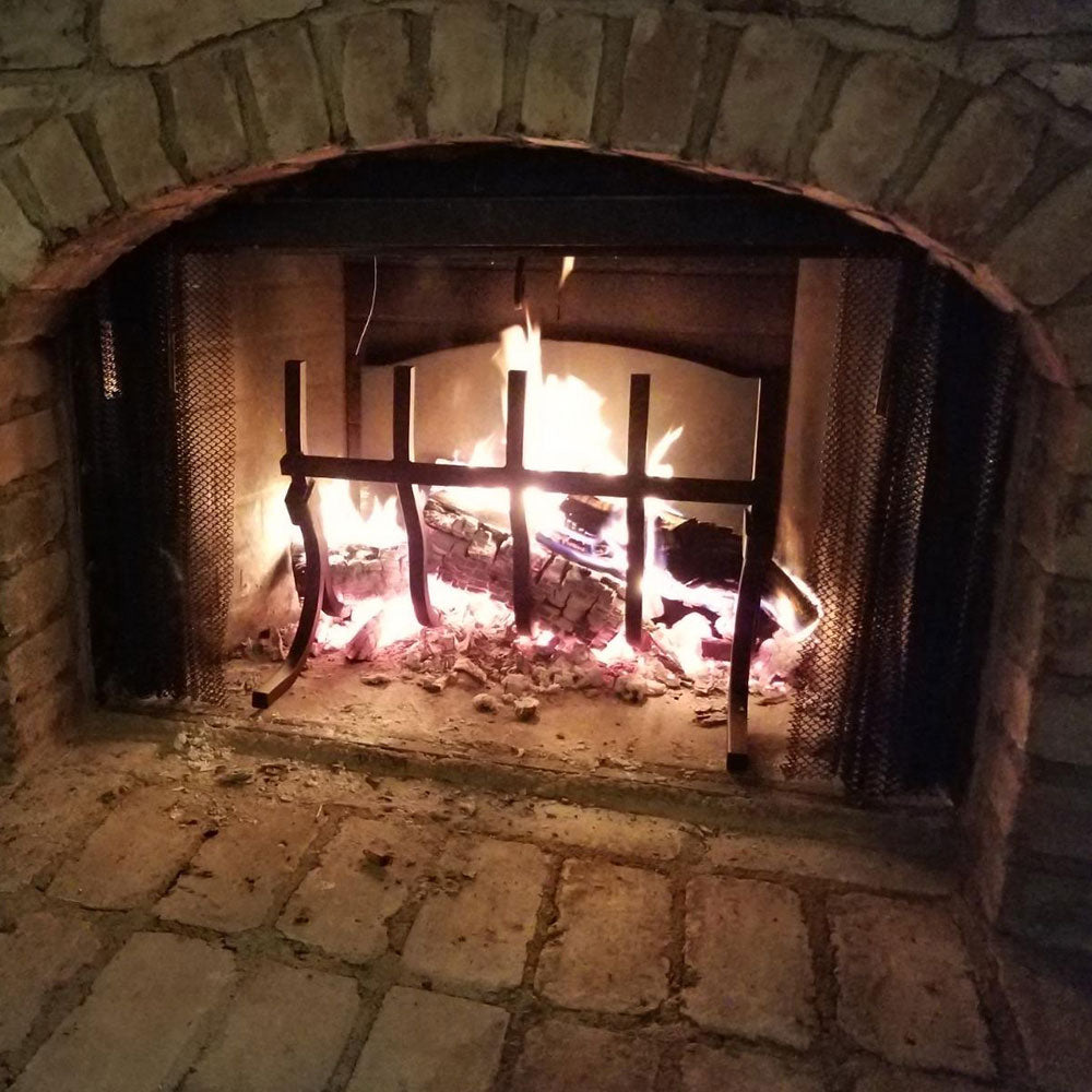 High-Efficiency Log Grate with Reflective Fireback