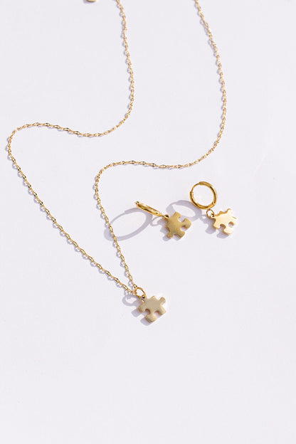 Puzzle Piece Huggie Hoops